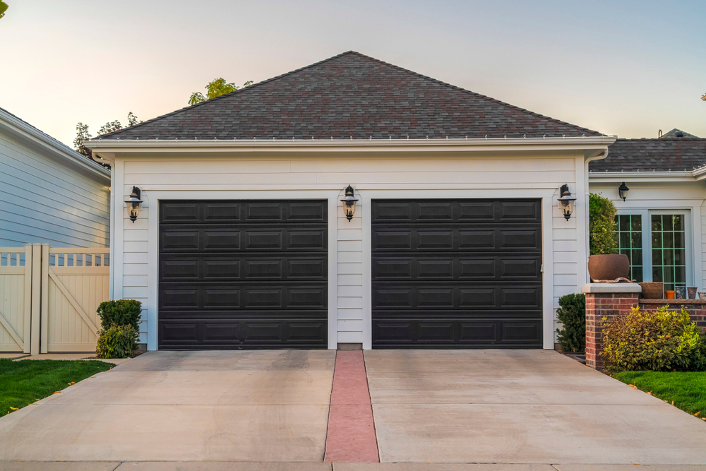 dark brown garage doors installed to match your neighborhood
