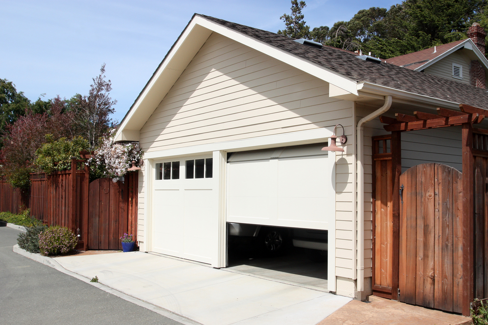 Automatic Garage Door Opener opening a home's garage mid-afternoon